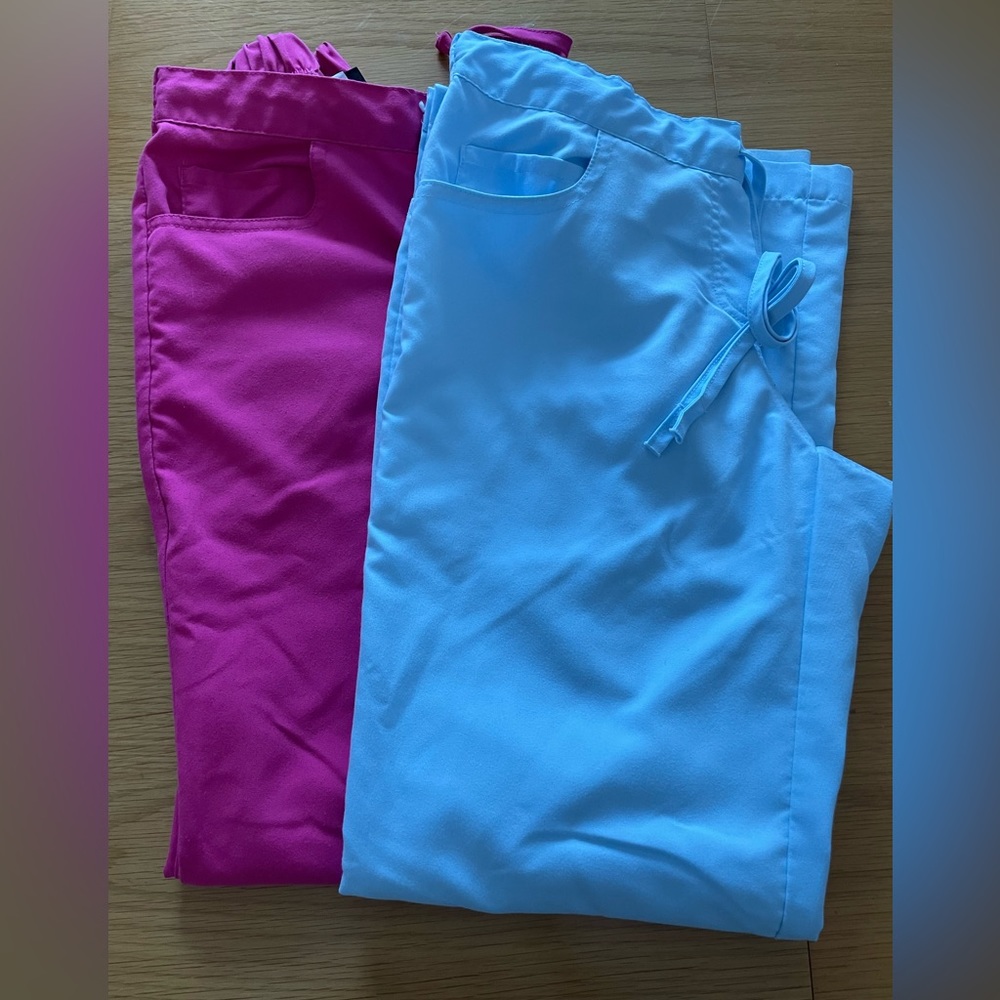 2 pairs of xtra small greys anatomy scrub pants.